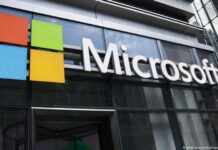Microsoft Layoffs: 4,800 Jobs Cut as Xbox Downsizes and Spins Off Four Gaming Studios Xbox controller with layoff news headline