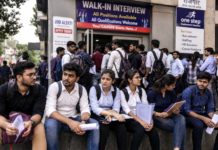 India Youth Unemployment: Why Degrees Fail to Secure Jobs Young Indian graduates wait for job opportunities amid rising youth unemployment in India.