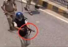 Bihar Police Constable Suspended After Firing AK-47 During Protest: Rules on Automatic Firearms Explained Bihar police personnel standing guard during a public demonstration in Siwan.