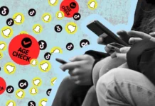A Blunt Instrument for a Complex Crisis: Why Governments Worldwide Are Pushing Social Media Bans for Minors Young teenager looking at a smartphone screen with social media icons