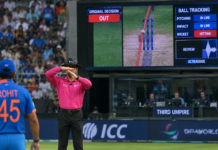 How DRS Works in Cricket: The Technology Explained Cricket umpire signals for DRS review as ball tracking technology appears on the stadium screen