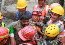 170m Under Mud, 9 Days Trapped: How 2 Nepal Workers Were Rescued Emergency personnel carrying survivor Sanjay Sah on a stretcher after the dramatic Trishuli 3A Nepal tunnel rescue