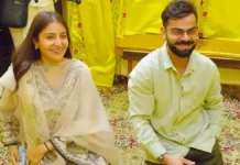 Virat Kohli Refutes Claim He Visited Premanand Ji Maharaj for Rs 5 Cr Virat Kohli and Anushka Sharma seated seeking blessings at Radha Keli Kunj Ashram
